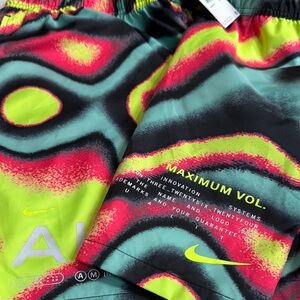 Nike Black and Green Athletic Shorts Dynamic Design